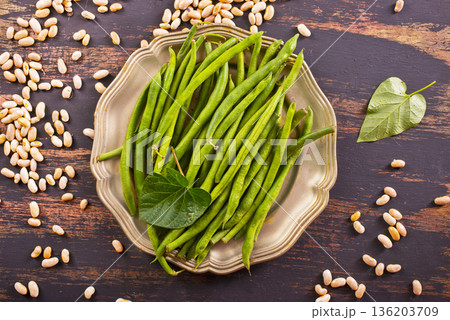 Common bean on darkj table with leaf Common bean on darkj table with leaf 136203709