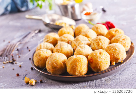 Falafel balls - healthy vegan dish made from ground chickpeas with corriander and parsley. Falafel balls - healthy vegan dish made from ground chickpeas with corriander and parsley. 136203720