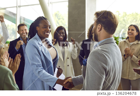 Business people standing in office making deal or signing contract on meeting. Business people standing in office making deal or signing contract on meeting. 136204678