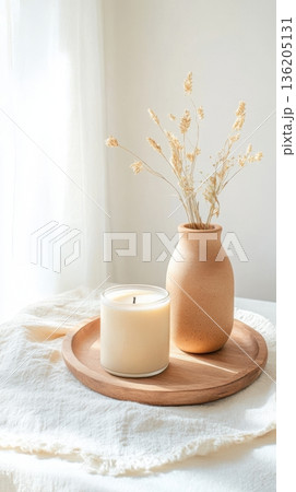 white ceramic cup on white table in bedroom 136205131