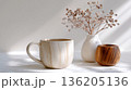 white coffee cup on wooden table 136205136