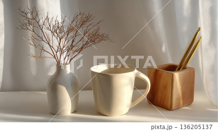 cup of tea and a teapot on the table 136205137