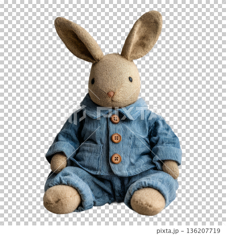 Adorable plush bunny character dressed in a charming blue corduroy pajama set, perfect for children's books, nursery decor, and whimsical storytelling projects. Adorable plush bunny character dressed in a charming blue corduroy pajama set, perfect for children's books, nursery decor, and whimsical storytelling projects. 136207719