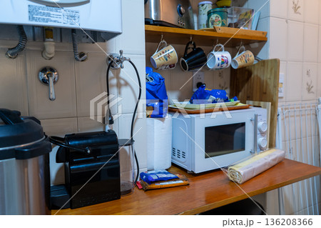 Wooden countertop in a kitchen with appliances Wooden countertop in a kitchen with appliances 136208366