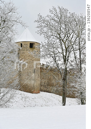 The beautiful old castle of Veveri Brno, Czech Republic. Winter landscape with snow and nature surrounding the castle. The beautiful old castle of Veveri Brno, Czech Republic. Winter landscape with snow and nature surrounding the castle. 136208547