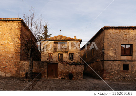 Medinaceli medieval village street with traditional stone house 136209165