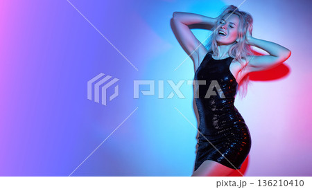 Happy Blonde Woman Dancing Under Neon Lights In Sequin Dresst, Night Club Life, Vivid Blue And Magenta Rim Lighting, Confident Smile, Glamorous Nightlife, Little Black Dress, Fashion Style Happy Blonde Woman Dancing Under Neon Lights In Sequin Dresst, Night Club Life, Vivid Blue And Magenta Rim Lighting, Confident Smile, Glamorous Nightlife, Little Black Dress, Fashion Style 136210410