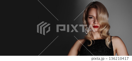 Sophisticated Female Model Exuding Boldness And Elegance In Studio Setting. Radiant Blonde Woman Dressed In Sequins Portrays Authority And Allure Through Confident Stance And Striking Accessories 136210417
