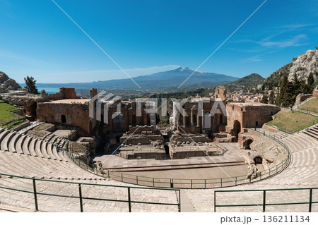 Ancient Greek Theatre of Taormina with Mount Etna in the background, Sicily, Italy Ancient Greek Theatre of Taormina with Mount Etna in the background, Sicily, Italy 136211134