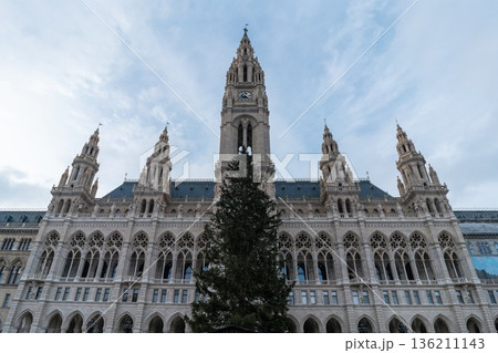 Vienna City Hall facade with clock tower and Christmas tree. Vienna, Austria 136211143