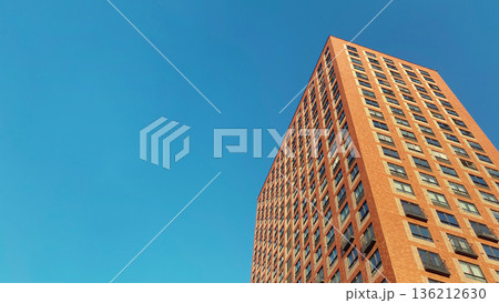 Architecture and real estate, modern residential apartment building with large panoramic windows Architecture and real estate, modern residential apartment building with large panoramic windows 136212630