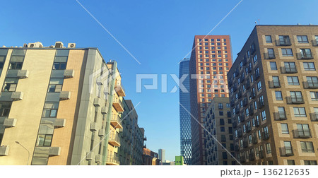 Architecture and real estate, modern residential apartment building with large panoramic windows Architecture and real estate, modern residential apartment building with large panoramic windows 136212635