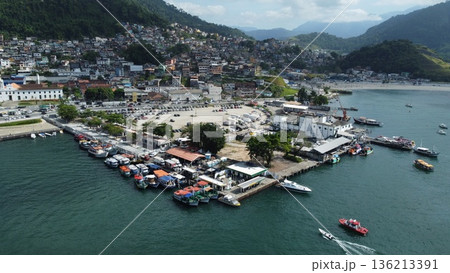 Colorful fishing boats at pier in Angra dos Reis Brazil Colorful fishing boats at pier in Angra dos Reis Brazil 136213391