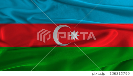 Flag of Azerbaijan with fabric textured background. Close up of National flag of Azerbaijan with realistic texture 136215799