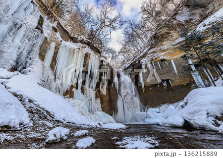 Snow and Frozen Waterfall at Nanajo Falls in Hokka 136215889