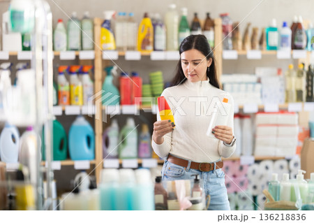 woman went to a hardware store in Spain for suntan products and SPF woman went to a hardware store in Spain for suntan products and SPF 136218836