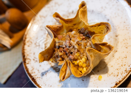 Traditional appetizer of Lithuanian cuisine pea beans fried or cooked in indoor grill with air fry 136219034