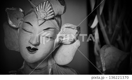 serene Bali dancer ceramic bust featuring closed eyes, bright lips, and gold embellishments. Ideal decorative sculpture for home, temple, or gallery displays, emphasizing art, culture, and craft serene Bali dancer ceramic bust featuring closed eyes, bright lips, and gold embellishments. Ideal decorative sculpture for home, temple, or gallery displays, emphasizing art, culture, and craft 136221370