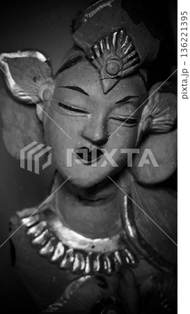 serene Bali dancer ceramic bust featuring closed eyes, bright lips, and gold embellishments. Ideal decorative sculpture for home, temple, or gallery displays, emphasizing art, culture, and craft 136221395