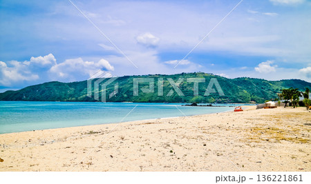 Beautiful view of white sand beach on tropical island, Mandalika beach, Lombok, Indonesia Beautiful view of white sand beach on tropical island, Mandalika beach, Lombok, Indonesia 136221861