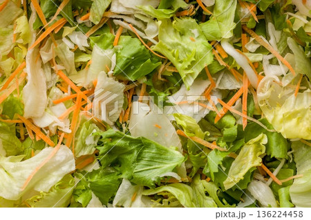 Mix of fresh green salad with carrot. 136224458