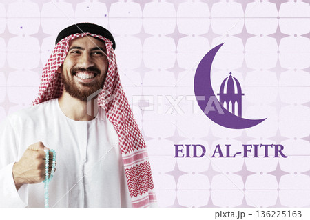 Celebration of Eid al-Fitr during Ramadan with a man smiling and holding prayer beads 136225163