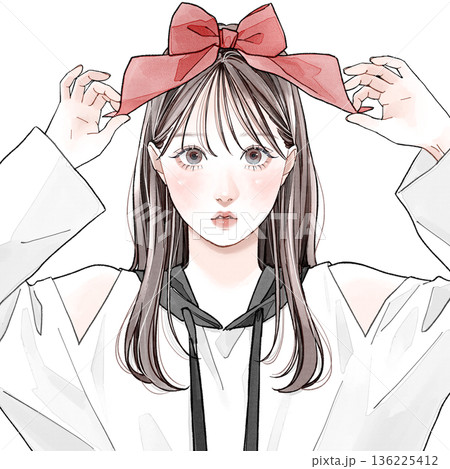 頭に大きなリボンをつけている女性 136225412