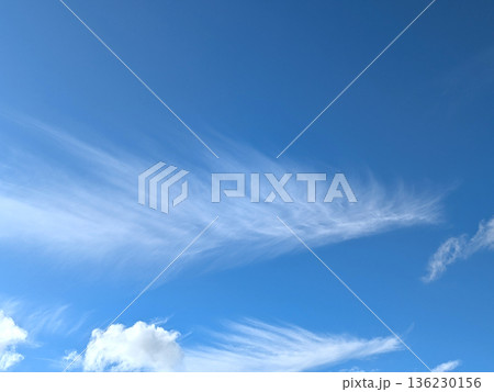 White fluffy clouds on a beautiful clear blue sky 136230156