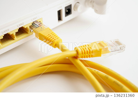 Ethernet cable with wireless router connect to internet service provider network. 136231360