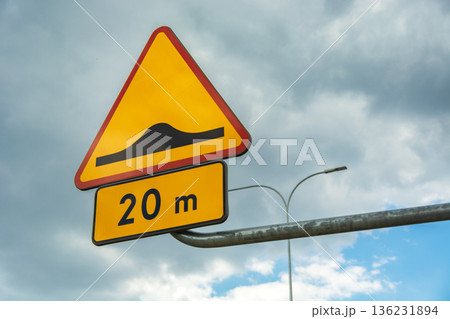 Road sign speed bump against the sky 136231894