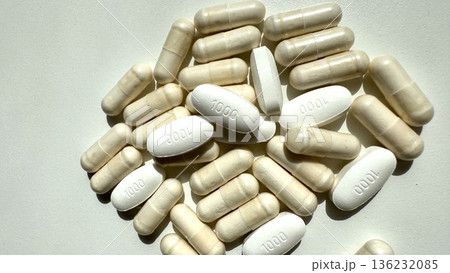 Lifestyle Wellness Message With Microbiome Focus And Supportive Capsules. Closeup Of Discomfort Healing Capsules Arranged In Circular Pattern Emphasizing Digestive Health Benefits Lifestyle Wellness Message With Microbiome Focus And Supportive Capsules. Closeup Of Discomfort Healing Capsules Arranged In Circular Pattern Emphasizing Digestive Health Benefits 136232085