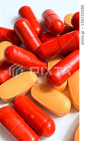 Detailed View Of Supplement Capsules And Tablets With Label Information. Studio Shot Showcasing Vibrant Capsules And Pills With Clear Labeling For Health Marketing Detailed View Of Supplement Capsules And Tablets With Label Information. Studio Shot Showcasing Vibrant Capsules And Pills With Clear Labeling For Health Marketing 136232086