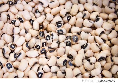 A full-frame shot of many raw black-eyed peas, a variety of cowpea bean 136232925