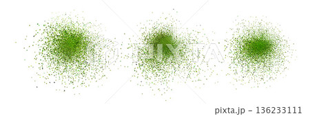 Isolated green matcha dust and powder splashes with mint spray effect and flying green leaves, top view on white background. Isolated green matcha dust and powder splashes with mint spray effect and flying green leaves, top view on white background. 136233111
