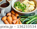 Traditional recipe hot pot meal with gravy, baby carrots and potatoes garnished with parsley 136233534