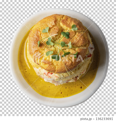 Crab meat souffle saffron sauce microgreen garnish gourmet seafood dish 136233691