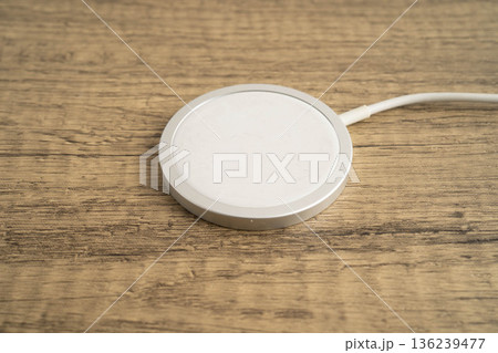 Wireless charger, magnetic charging modern equipment of mobile phone. 136239477