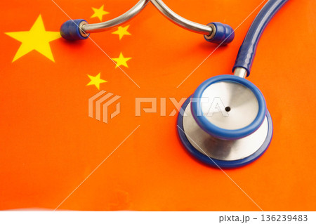 China flag with black stethoscope, Business and finance. China flag with black stethoscope, Business and finance. 136239483