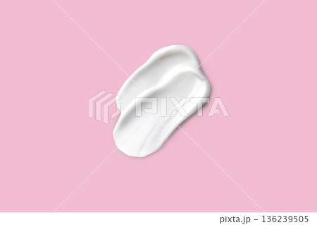 Beauty swatch sampled with a smear of white cream. Face skin care, hand care, facial care. Isolated photo pink background 136239505