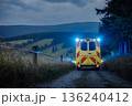 Ambulance car of emergency medical service on mountain road 136240412