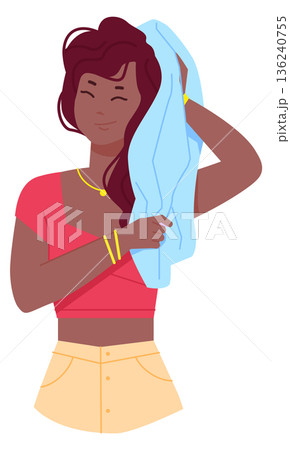 Drying hair with cloth towel. Woman wipe water 136240755