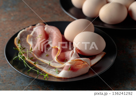 Pork bacon with thyme and eggs. Pork bacon with thyme and eggs. 136241292