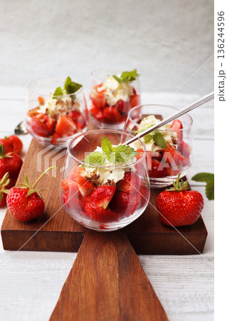Fresh Strawberry Desserts with Cream and Mint Fresh Strawberry Desserts with Cream and Mint 136244596