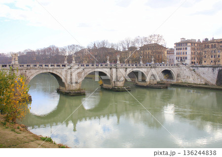 St. Angelo Bridge and the Trastevere district with River Tiber in Rome, Italy St. Angelo Bridge and the Trastevere district with River Tiber in Rome, Italy 136244838