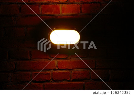 Old red brick wall with street light Old red brick wall with street light 136245383