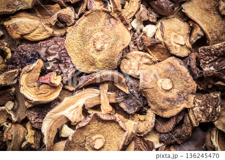Dry mushrooms as food background Dry mushrooms as food background 136245470