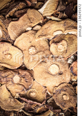 Dry mushrooms as food background Dry mushrooms as food background 136245472