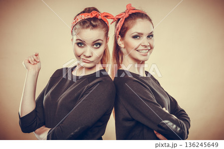 Crazy pin up retro girls making funny faces. Crazy pin up retro girls making funny faces. 136245649