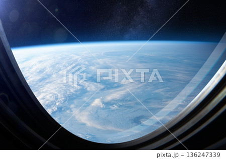 Planet Earth in spaceship porthole. Space scene. 136247339