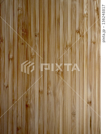 A close-up shot of a wooden board. The textured background is made of natural wood. A close-up shot of a wooden board. The textured background is made of natural wood. 136248817